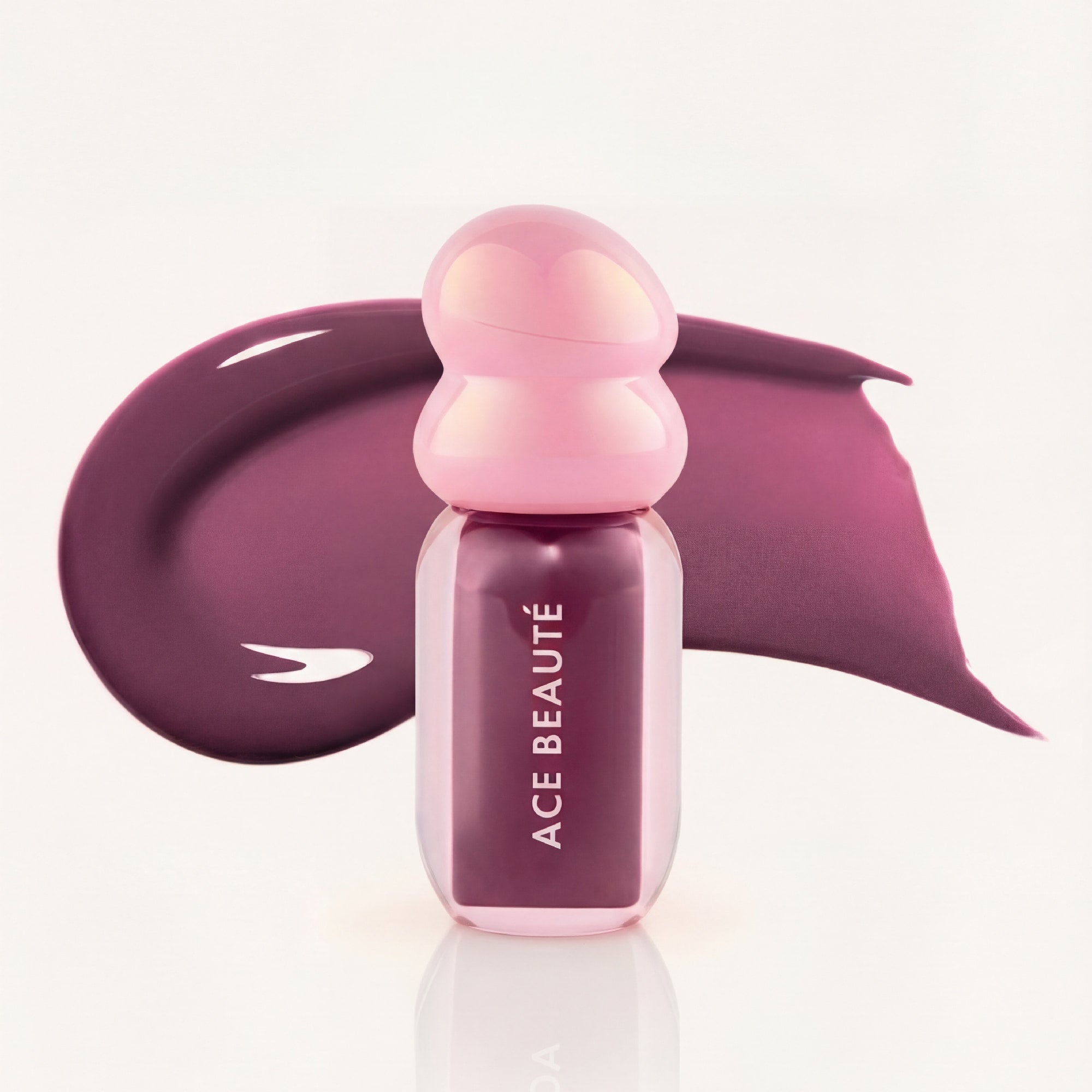 Soft Ambition lip gloss swatch showing mauve shine