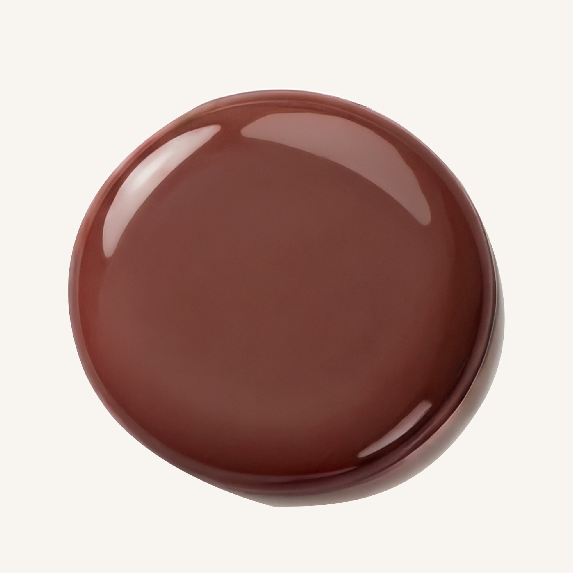 Sweet Intent lip gloss swatch showing milky brown shine