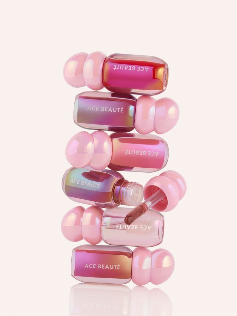 Aura Glass Hi Shine Lipgloss collection showcasing 6 shades