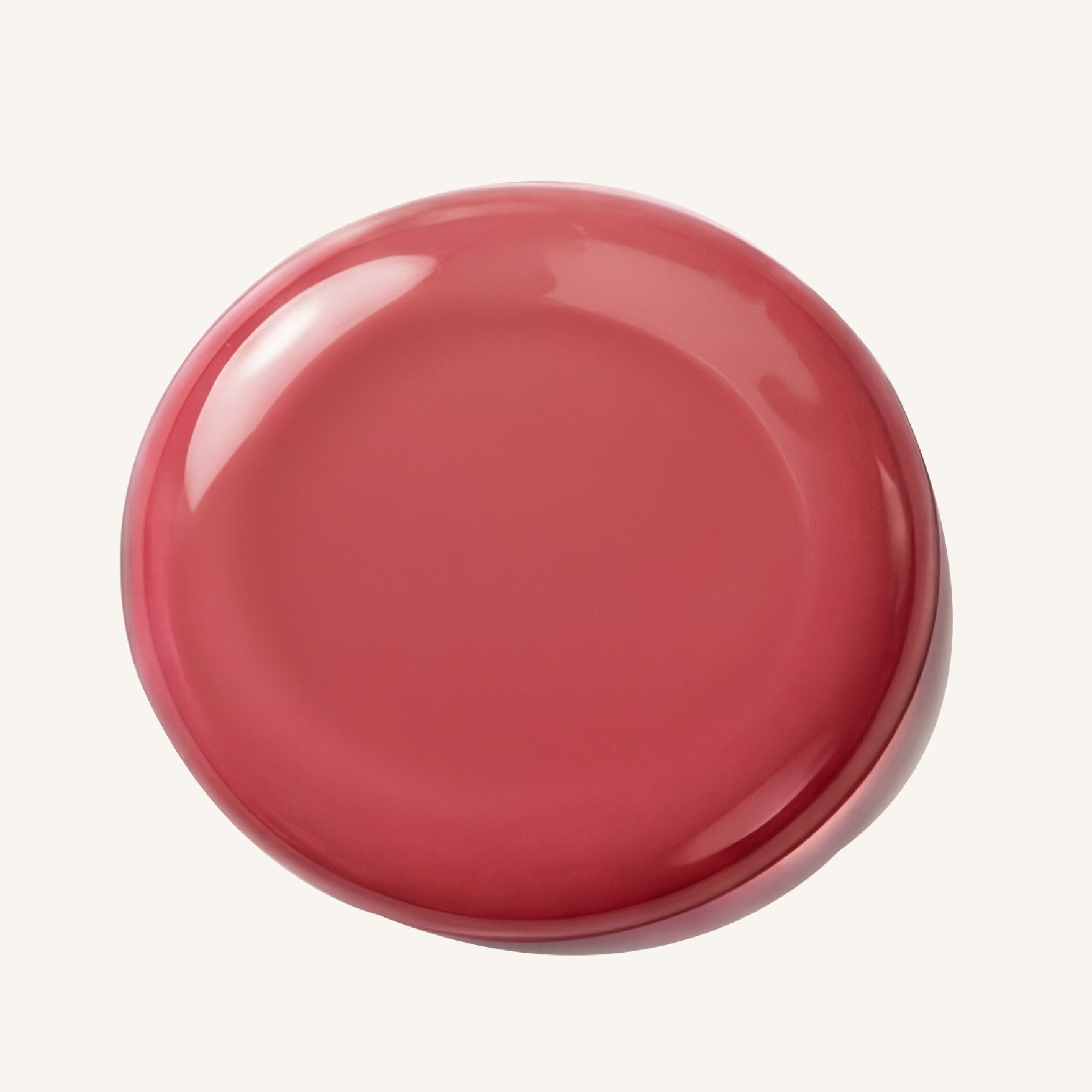 True Aura lip gloss swatch showing rose pink shine

